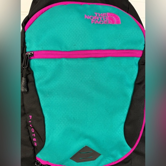 The North Face Pivoter black, pink, teal backpack. - Picture 5 of 9